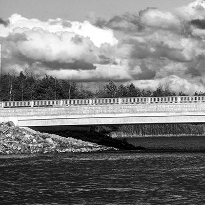 landscape bridge rough water photograph